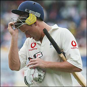 Andrew Flintoff walks back to the pavilion