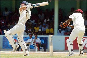 England captain Michael Vaughan hits the ball for six