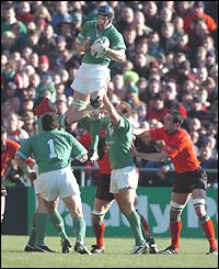 Paul O'Connell (centre) jumps to win a line-out for Ireland