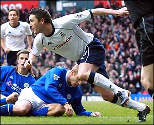 Robbie Keane wheels away after scoring against Leicester
