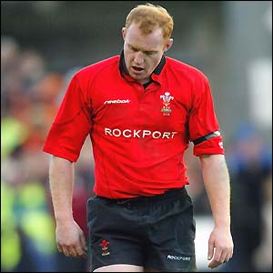 A despondent Wales captain Martyn Williams leaves the pitch after the final whistle