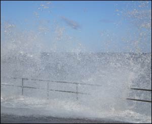 Waves crash at Colwyn Bay, as captured by Paul Daly