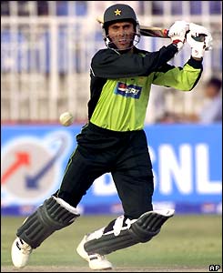 Abdul Razzaq smashes the ball away