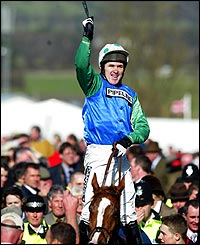 Tony McCoy riding Well Chief celebrates winning the Irish Independent Arkle Challenge 