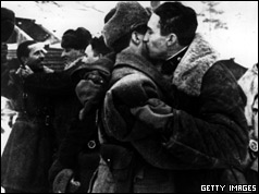 Russian soldiers hugs each other when a corridor is opened to Leningrad in January 1943