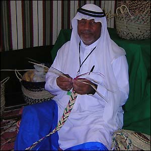 A Bedouin basket maker, who was one of many of the artisans at the event