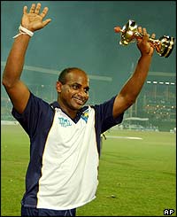Sri Lanka's Sanath Jayasuriya celebrates after claiming the man of the series award