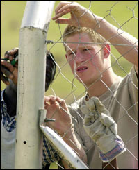 Harry has his worked checked. 
