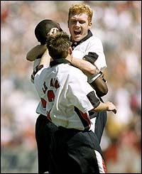 Paul Scholes celebrates scoring against Tunisia in the 1998 World Cup in France