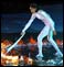 Aboriginal athlete Cathy Freeman lights the flame 