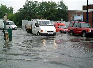 Vans sink into road emailed in by Flavio Viana