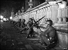 Mexican troops crouch in the Tlatelolco during the violence