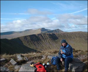 Michael Brain's wife Hilary enjoying a sandwich during a walk in the Brecon Beacons