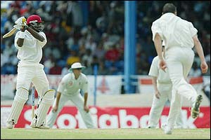 Chris Gayle cracks the ball to the boundary