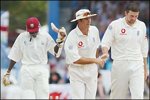 Corey Collymore leaves the crease while Michael Vaughan and Steve Harmison celebrate