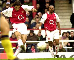 Arsenal's Robert Pires shoots and scores against Bolton