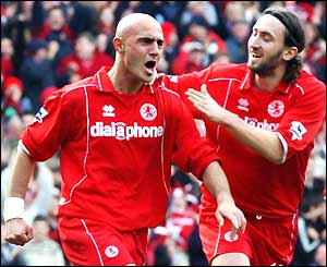 Massimo Maccarone celebrates a goal with Jonathan Greening
