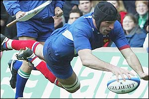 Olivier Magne scores the opening try for France after seven minutes