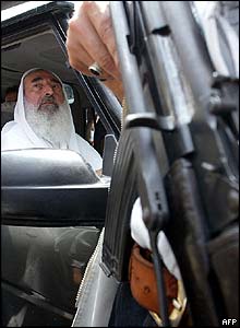 Yassin in front seat of jeep during anti-US demo in Gaza City