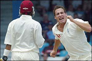 Simon Jones celebrates as he Ramnaresh Sarwan is trapped lbw for 13