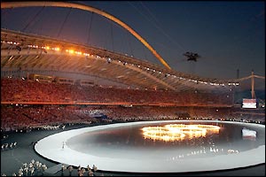 The five Olympic rings are gradually set alight