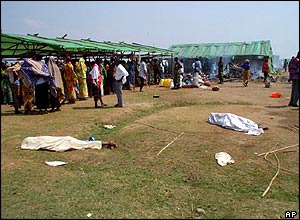 Bodies lying on the ground.