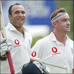 Mark Butcher and Graham Thorpe celebrate victory