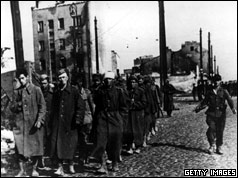 The end of Warsaw's uprising sees a group of city defenders marched off to prison camps by their German captors