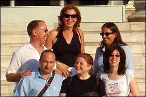 Thanks to Stephen Askins for this shot of a group of friends waiting at the Piraeus Theatre for a glimpse of the Olympic Torch