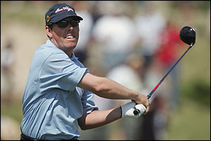 Justin Leonard of the USA tees off on the second