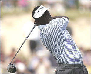 Vijay SIngh tees off at the second