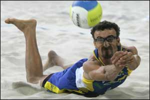 Brazil's Alex Ricardo returns the ball during a first round beach volleyball match at the 2004 Olympic Games in Athens 
