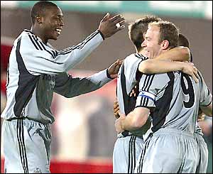 Alan Shearer (right) celebrates with his Newcastle team mates