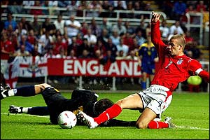 David Beckham scores