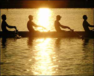 Rowers practice in the early morning light