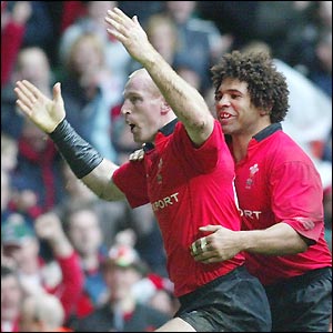 Gareth Thomas' second-half score means he passes Ieuan Evans' record of 33 international tries to become Wales' leading try-scorer