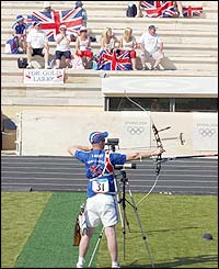 Laurence Godfrey's parents watch from the stands as the Brit is beaten 