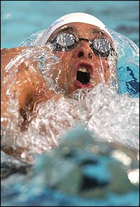 James Goddard competes in the 200 metre backstroke final 