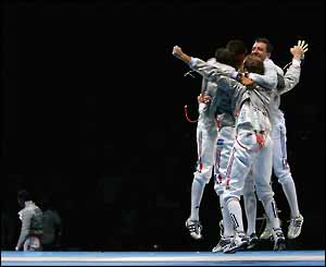 The French team celebrate winning