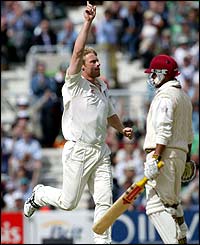 Andrew Flintoff celebrates the wicket of Sarwan