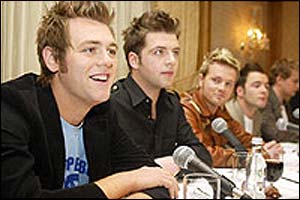 Westlife at a news conference announcing Bryan McFadden was leaving the band