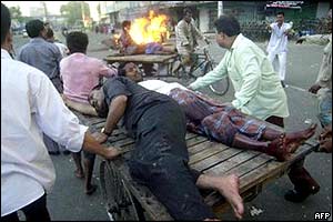 Injured victims taken away on a cart