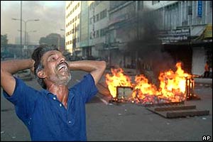 Awami League supporter in grief after the blasts