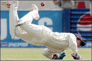 Indian wicket-keeper Patel dives for but misses a shot by Yousuf Youhana 