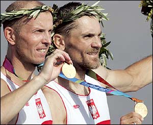 Poland's Tomasz Kucharski and Robert Sycz celebrate winning the gold medal in the lightweight men's double sculls final 