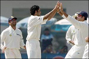 Pathan celebrates his fourth wicket