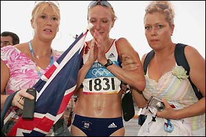 Two of Paula Radcliffe's supporters offer the British star some help