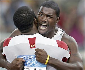 Justin Gatlin takes gold ahead of Francis Obikwelu and Maurice Greene