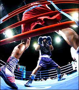 Willy Blain of France faces Manus Boonjumnjong