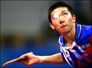 South Korea's Seung Min Ryu serves en route to beating China's Hao Wang in the men's singles table tennis gold medal match